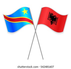 Congolese and Albanian crossed flags. Democratic Republic of the Congo combined with Albania isolated on white. Language learning, international business or travel concept.