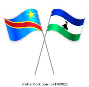 Congolese and Basotho crossed flags. Democratic Republic of the Congo combined with Lesotho isolated on white. Language learning, international business or travel concept.
