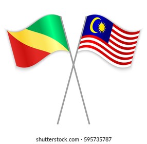 Congolese and Malaysian crossed flags. Republic of the Congo combined with Malaysia isolated on white. Language learning, international business or travel concept.