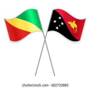 Congolese and Papuan crossed flags. Republic of the Congo combined with Papua New Guinea isolated on white. Language learning, international business or travel concept.