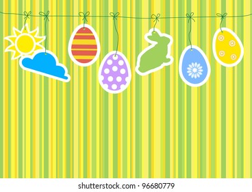 congratulation to a green background with paper Easter eggs