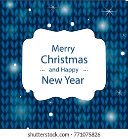 Congratulation of a Merry Christmas on a blue knitted background