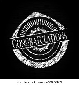 Congratulations chalk emblem written on a blackboard
