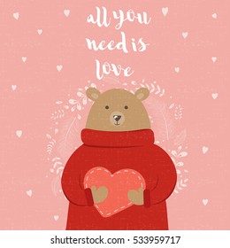 Congratulatory card with cute bear on pink background. With handwriting text - All you need is love