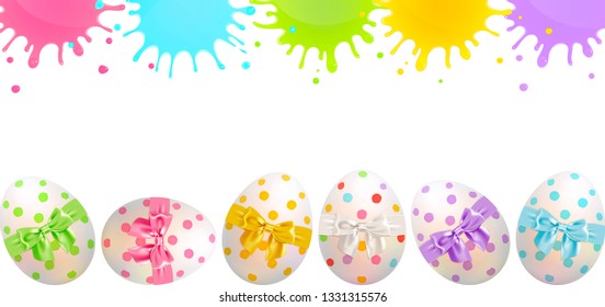 congratulatory Easter banner with painted Easter eggs and splashes of paint on a white background