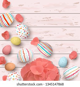 Congratulatory easter eggs on white shabby white wooden background. Easter colorful eggs with different simple doodle ornaments and hydrangea