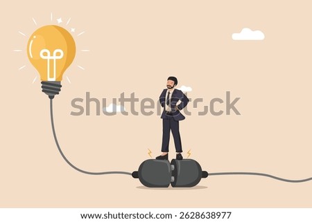 Connecting to Innovation. Businessman Plugging into a Bright Light Bulb Representing a New Idea.