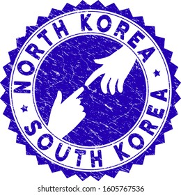 Connecting North Korea South Korea stamp. Blue vector rounded textured stamp imprint with connecting hands for North Korea South Korea. Symbol of political collaboration, cooperation,