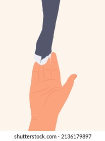 the connection of a cat's paw and a human hand as a sign of devotion and love