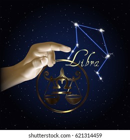 Constellation of the sign of the zodiac against the background of the starry sky and finger of the hand.