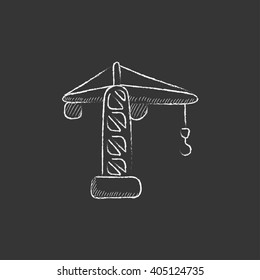 Construction crane. Drawn in chalk icon.