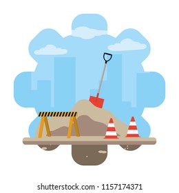 construction equipment with traffic cones and caution sign