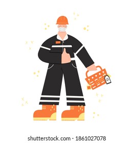 Construction or factory worker wearing hard hat, face mask, work clothing and boots. Worker during covid pandemic with LOTO box, locks; tags. Health and safety at work. PPE