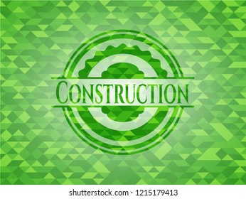 Construction green emblem with mosaic background