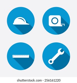 Construction helmet and wrench key tool icons. Ruler and tape measure roulette sign symbols. Circle concept web buttons. Vector