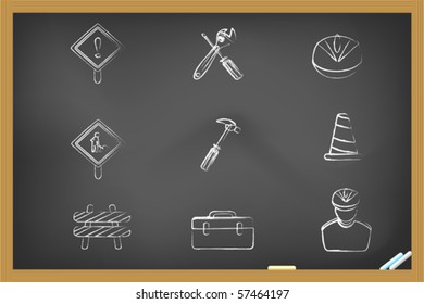 Construction icons drew on blackboard