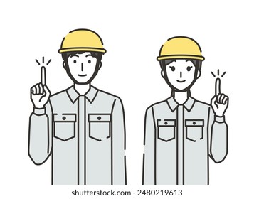 Construction industry man and woman in pointing pose