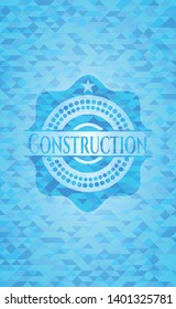 Construction light blue emblem with triangle mosaic background