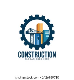 Construction logo design concept with buildings and crane inside cog gear