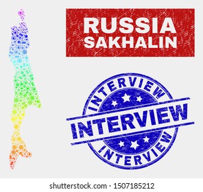 Construction Sakhalin Island map and blue Interview grunge seal stamp. Spectrum gradiented vector Sakhalin Island map mosaic of tools. Blue round Interview stamp.