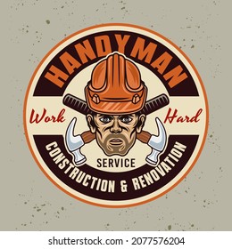 Construction service and handyman vector vintage round emblem, label, badge or logo with worker head in hard hat and two crossed hammers. Illustration in colorful cartoon style on light background