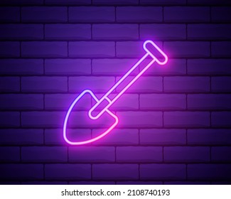 Construction shovel neon icon. Vector illustration for design. Repair tool glowing sign. Construction tools concept isolated on brick wall