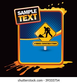 construction sign on orange splattered advertisement