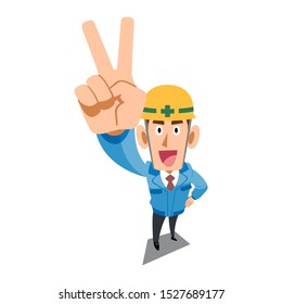 Construction site worker wearing blue work clothes showing peace sign