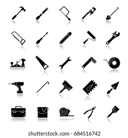 Construction tools drop shadow black glyph icons set. Renovation and repair instruments. Spanner, shovel, hammer, paint brush, crowbar, measuring tape, paint brushes. Isolated vector illustrations