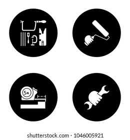 Construction tools glyph icons set. Jeweler saw set, paint roller, meter, wrench in hand. Vector white silhouettes illustrations in black circles