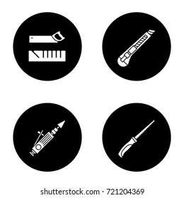 Construction tools glyph icons set. Mitre box, handle pad saw, stationery knife, air-operated valve grinder. Vector white silhouettes illustrations in black circles