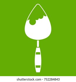 Construction trowel icon white isolated on green background. Vector illustration