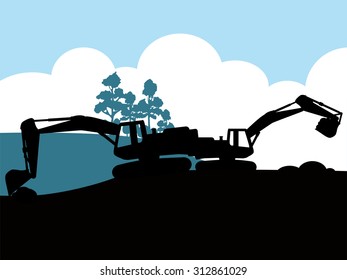 Construction vehicles at site silhouette