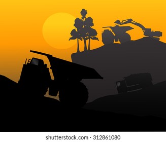 Construction vehicles at site silhouette