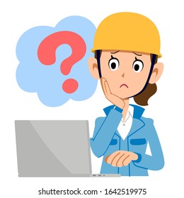 A construction woman who operates a computer with doubt blue clothes