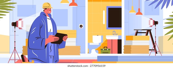 Construction worker bathroom renovation project planning tablet hard hat blue jacket modern interior tiles tools lighting equipment plants background