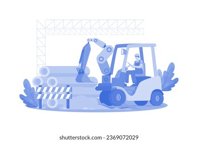 Construction worker clears site with heavy machinery.