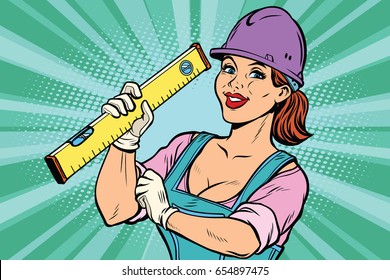 Construction worker with level. Woman professional