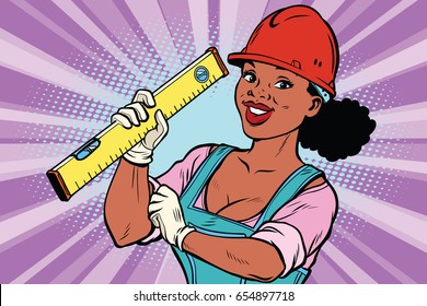 Construction worker with level. Woman professional