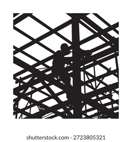 Trabajador de la construcción silueteado contra el marco esquelético de un edificio