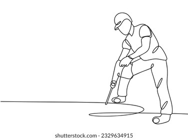 A construction worker splits a hard surface with a jackhammer. Day of builder. One line drawing for different uses. Vector illustration.