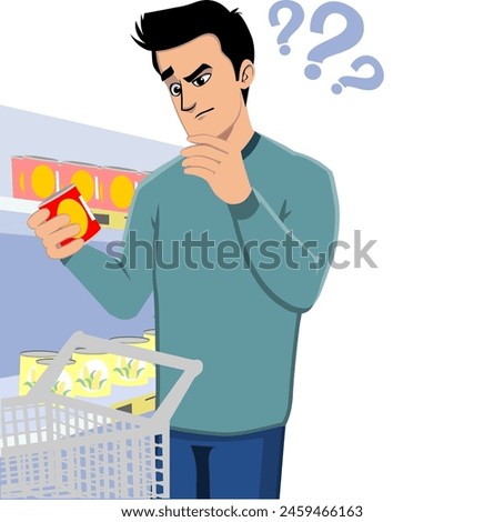 Consumer using a trolley cart in the supermarket,holding and uncertainly examining a can of product,label information,ingredients and expiration date.Product labeling