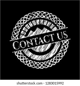 Contact us written on a chalkboard