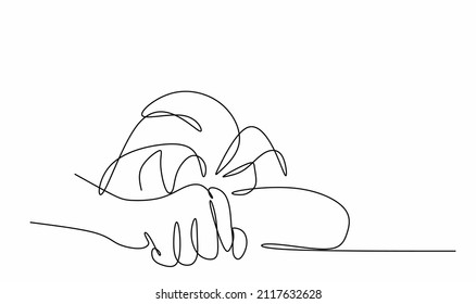 continuous drawing of a man's head bowed on his hands and on the table