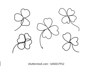 Continuous line art, hand drawn shamrock set. Clover, hand drawn lucky symbol. Vector illustration for design slogan, t-shirts.
