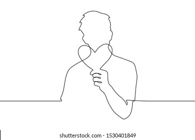 continuous line art Silhouette of a man holding a paper heart. He offers a heart to the viewer. The concept of kindness, love, support, care. It can be used for animation. Vector