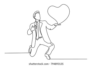 continuous line. A businessman, a man in a suit and tie, is standing on one knee and holding his heart in his hand. Lines on a white background. St. Valentine's Day