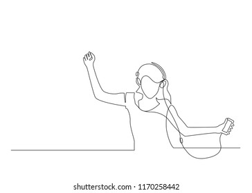 Continuous line drawing. Beautiful young woman in headphones listening to music on white background vector illustration. - Vector