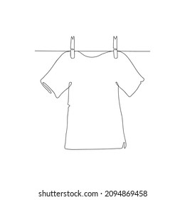 Continuous line drawing cloth, the T-shirt is drying on a rope, one line drawing. Vector illustration.