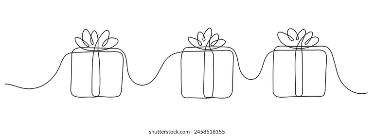 Continuous line drawing of gift box with bow on white background. 